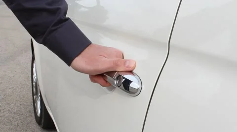 Hand Closing Door of White Car Stock Footage 61730729