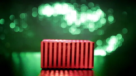 Hand closing red gift box on green background Stock Footage 52182680