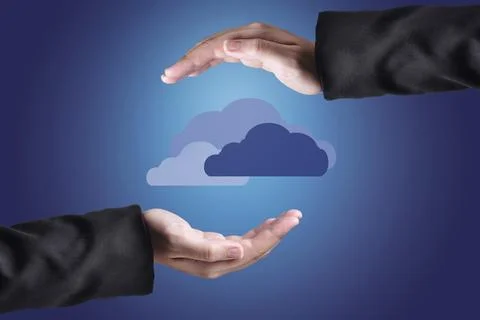 Hand with clouds over them. Cloud computing concept Stock Photos