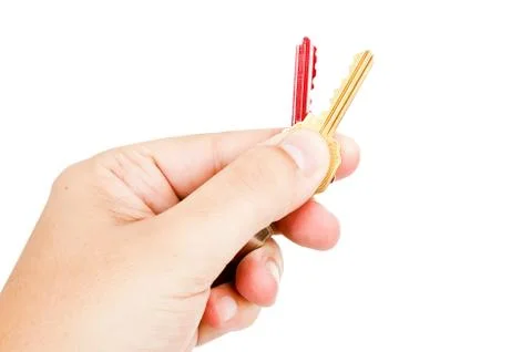 Hand with colored keys Stock Photos
