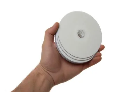 Hand with compact disks, isolated on white background Stock Photos