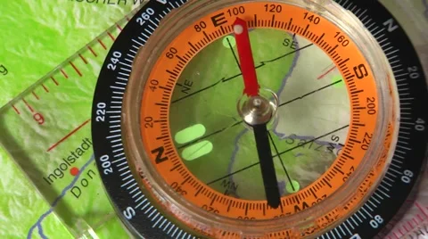 Hand compass on map background Stock Footage 60043478