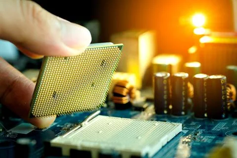 Hand of computer engineering brings computer cpu processor memory change comp Stock Photos