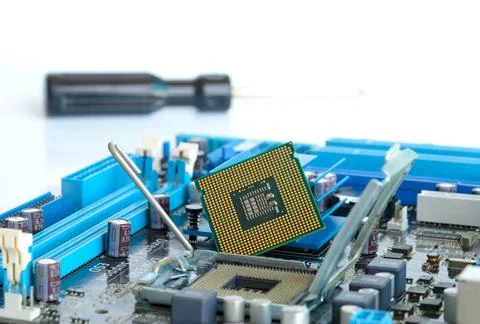 Hand of computer engineering brings computer cpu processor memory change comp Stock Photos