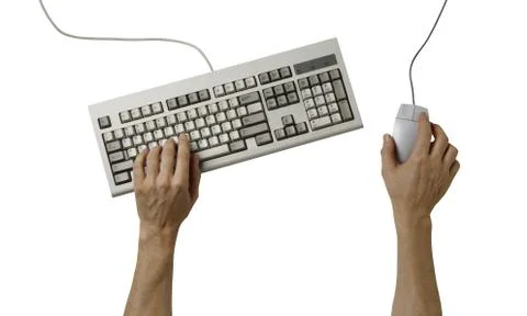 Hand on computer keyboard and computer mouse isolated on a white background Stock Photos