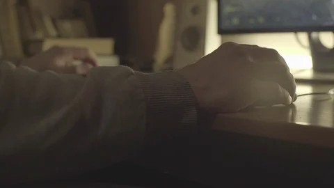 Hand on a computer mouse close-up, a man plays a game Stock Footage 129521444