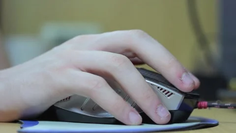 Hand with a computer mouse. Video stock 169810203