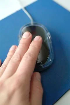 Hand on computer mouse Foto stock