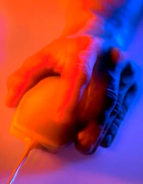 HAND ON COMPUTER MOUSE Foto stock