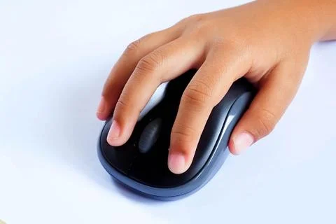 Hand with computer mouse on a white background. Stock Photos
