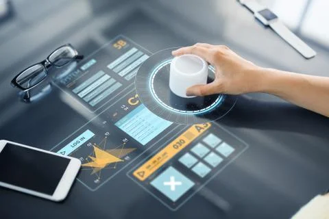 Hand with control knob on interactive panel Stock Photos