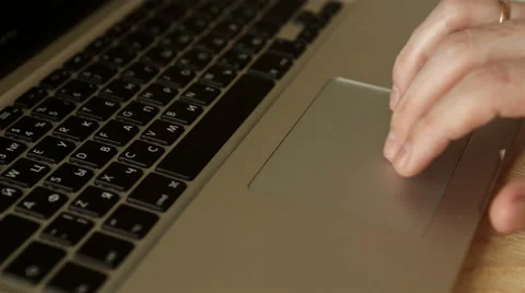 Hand control on a laptop touchpad 스톡 동영상 62853916