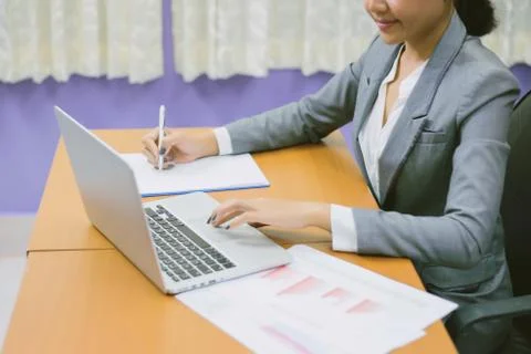 Hand control on a laptop touchpad Foto stock