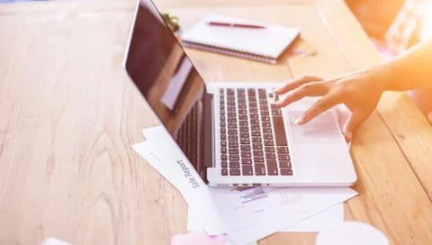 Hand control on a laptop touchpad Stock Photos