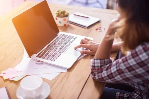 Hand control on a laptop touchpad Stock Photos