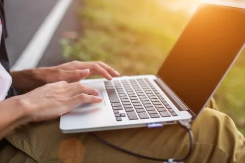 Hand control on a laptop touchpad Stock Photos