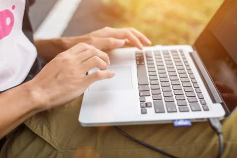 Hand control on a laptop touchpad Stock Photos