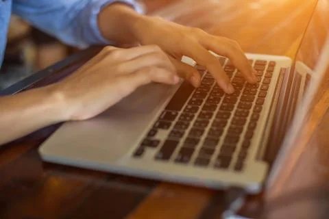 Hand control on a laptop touchpad Foto stock