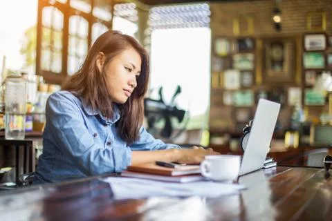 Hand control on a laptop touchpad Stock Photos