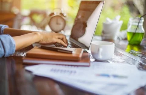 Hand control on a laptop touchpad Stock Photos