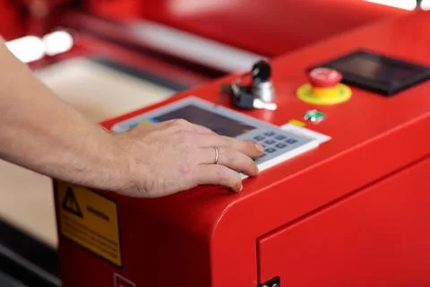 Hand on the control panel Stock-Fotos