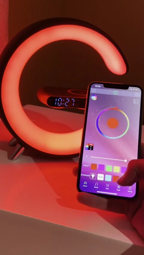 Hand Controlling Smart LED Lamp With Smartphone App Stock Footage 340879660