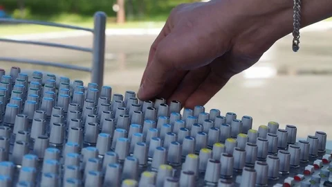 Hand controlling volume on concert Stock Footage 76164412