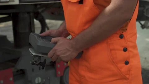The hand controls the control panel of road milling machines in motion. closeup Stock Footage 145466051