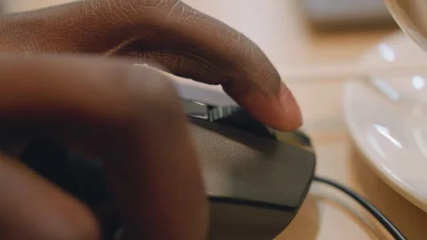 Hand controls mouse. Closeup of hand operating mouse during study session Stock Footage 335314849