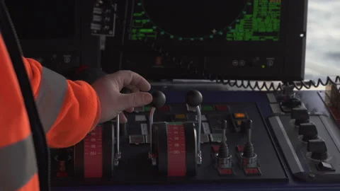 Hand controls the throttle stick. The bridge. The control panel on the ship Stock Footage 150727016