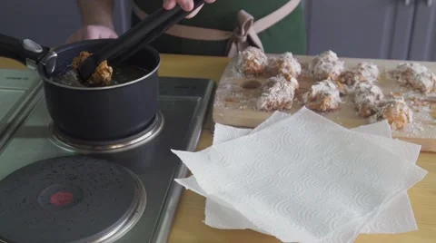 The hand of cook put the roast chicken on a plate Stock Footage 57607966