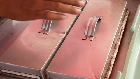 Hand cooking or making pukis cake using a special mold. 스톡 동영상 303649721