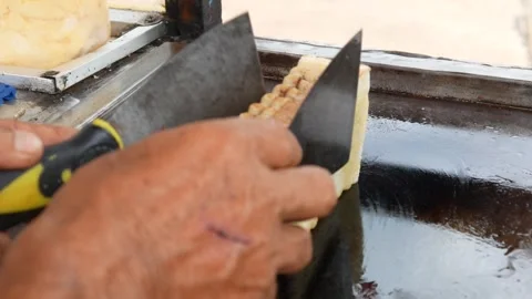 Hand cooking toast using spatula on grill Stock Footage 301599631