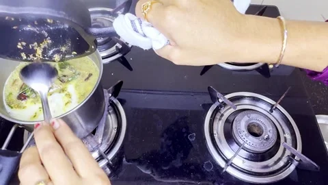 Hand Cooks in Indian Kitchen Stirring Spiced Mixture Stock Footage 305960474