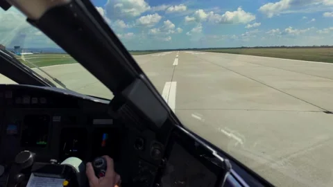 Hand of a Copilot Handling the Flight Controls in a Real Time Take-Off Through Stock Footage 315673065