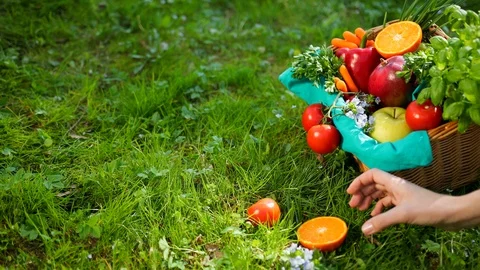 Hand Corrects Vegetables And Fruit In Wooden Basket From Beige Cloth. Prores Stock Footage 108506555