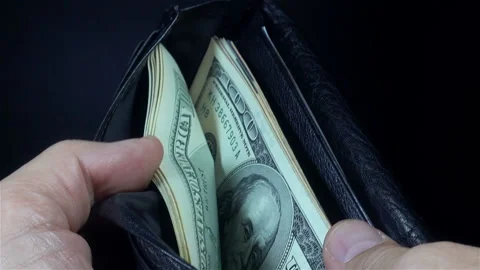 Hand count dollar bills in wallet Stock Footage 141867874