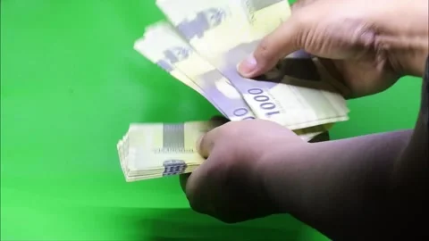 Hand count Realistic banknotes (Indonesian Rupiah) nominal 2000. HD Stock Footage 202849348