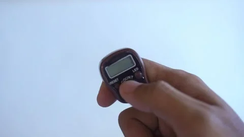 Hand counter clicker. Hand held tally counter, counter clicker Stock Footage 322159865
