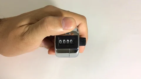 Hand counter counting from zero to twenty Stock Footage 125724805