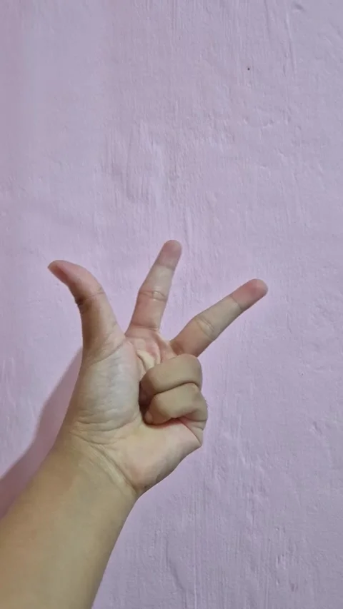 Hand counting from 1 to 5 by extending fingers Stock Footage 337058005