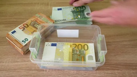 Hand counting big stack of euro money on wooden background. money cash, close Vídeo Stock 332795232