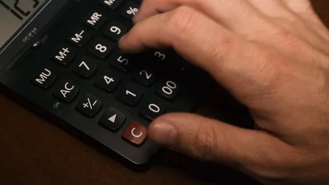 Hand counting on calculator 4K Stock Footage 93109905