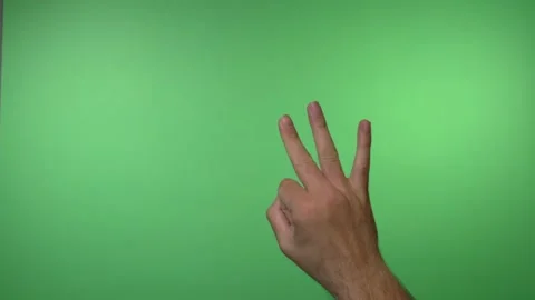 Hand Counting from One to Five on Green Background Video Stock Footage 330555888