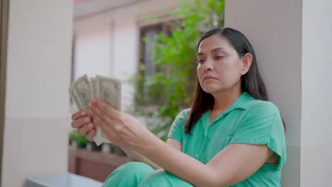 Hand counting US dollar bills or paying in cash, concept of investment, success, Stock Footage 265950197