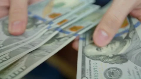 Hand counting US dollar papers. Closeup of Man employee hands counting dollar Stock-Footage 336260500