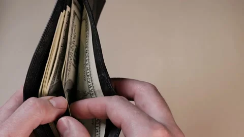 Hand counts 100 dollar bills in wallet. The concept of payment, investment, shop Video stock 221651292
