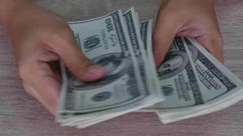 Hand counts dollar banknote money Stock Footage 160554575