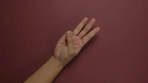 Hand counts down five, four, three, two, one, zero and exits the frame Stock Footage 200636296