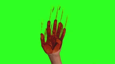 A hand covered in blood left a mark on the glass.On a neutral background, a Stock Footage 140415565